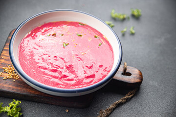 cream soup beetroot beets, leeks, potatoes first course healthy meal food snack on the table copy space food background rustic top view keto or paleo diet veggie vegan or vegetarian food