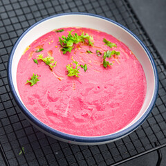 cream soup beetroot beets, leeks, potatoes first course healthy meal food snack on the table copy space food background rustic top view keto or paleo diet veggie vegan or vegetarian food