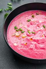 cream soup beetroot beets, leeks, potatoes first course healthy meal food snack on the table copy space food background rustic top view keto or paleo diet veggie vegan or vegetarian food