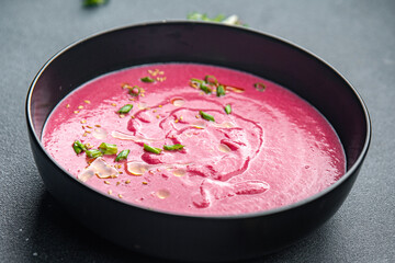 cream soup beetroot beets, leeks, potatoes first course healthy meal food snack on the table copy space food background rustic top view keto or paleo diet veggie vegan or vegetarian food