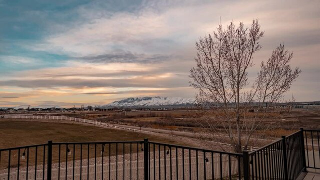 Sunset to nighttime time lapse from the backyard deck of a suburban home