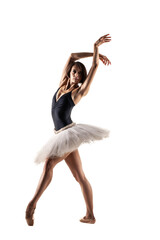 Female ballet dancer wearing tutu. Prima ballerina posing on white background © Nikola Spasenoski