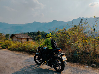 Rider riding bike in Bandarban, Bangladesh. Riding bike in hill area