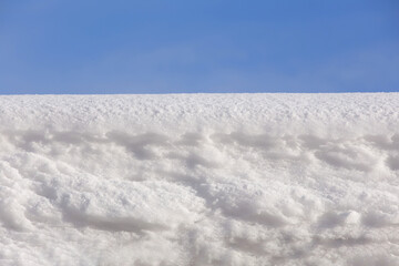 Fototapeta na wymiar white snow in daylight, background, isolate on black background
