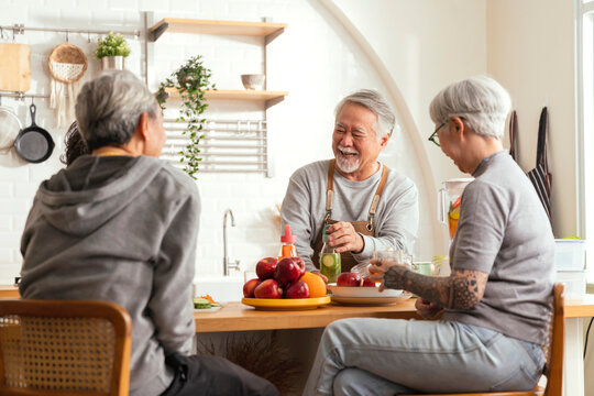 happiness cheerful asian multi generation family preparing healthy smoothie juice drink together at pantry kitchen at home,group of senior asia people preparing food party fun and happiness together