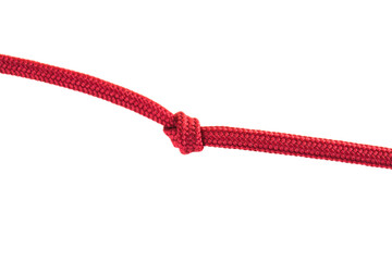 red shoe laces with a knot against white background