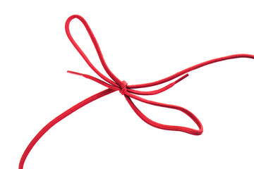 red shoe laces with a knot against white background