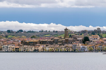 Panoramic view of Marta from Capodimonte, Bolsena lake, Italy - obrazy, fototapety, plakaty