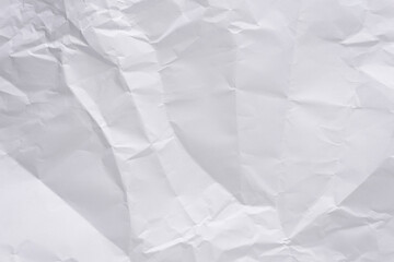 White crumpled paper texture background, clean white wrinkled paper, top view.