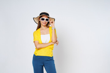 Young  woman in sunglasses wearing, colorful clothes and sun hat, isolated over white background.Lifestyle summer concept.