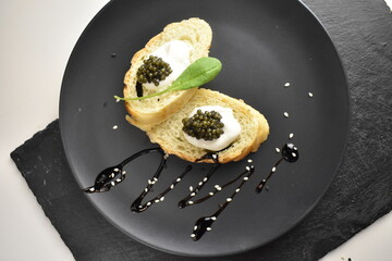 black caviar, serving option on the table