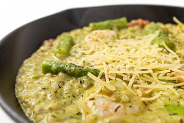 Asparagus risotto on a white background