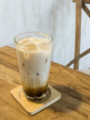 Iced coffee with milk in coffee shop