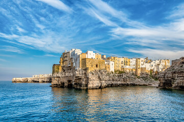 Scenic view of Polignano a Mare in Apulia in Italy against dramatic sky