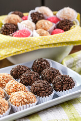 Various brazilian party sweets. (Beijinho, cajuzinho e brigadeiro)