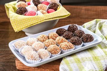 Various brazilian party sweets. (Beijinho, cajuzinho e brigadeiro)