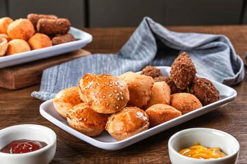 Various brazilian snacks deep fried. (Coxinha, kibe, empadinha e risolis).