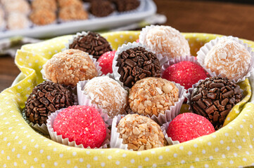 Various brazilian party sweets. (Beijinho, cajuzinho e brigadeiro)