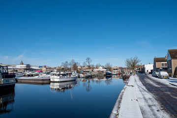 Fototapeta premium Water canal in the historic city of Sneek and winter