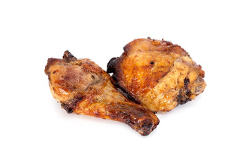 Chicken Drumsticks and Thighs marinated and baked until cooked ready to eat isolated on white background.