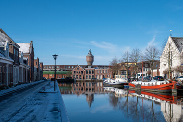 Water canal in the historic city of Sneek and winter
