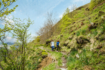 Young couple hiking in a magnificent landscape of the Larrau gorges in the French Basque country