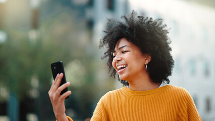 Fototapeta na wymiar Video call, phone and black woman in city talking online, travel update and 5g communication or funny chat. Laughing gen z person or student on cellphone, mobile and live streaming for urban outdoor