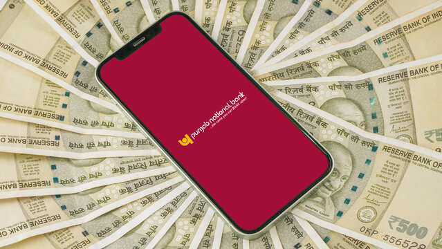 PNB or Punjab National Bank on mobile phone screen, isolated background: Kolkata, India - May 03 2023