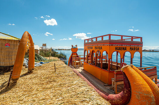 Uros, Peru - October 04, 2021. The floating islands of the Uros on the Lake Titicaca, are made entirely from totora reeds, located at 3 815 meters above sea level, Puno, Peru, South America