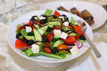 Greek salad on the holiday table