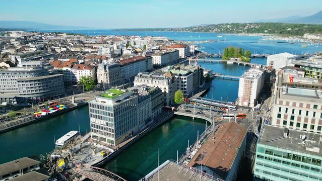 Aerial video of Geneva, Geneva city view to the lake. Taken above the old town. Pan CW Tour de l'&Icirc;le 1080
