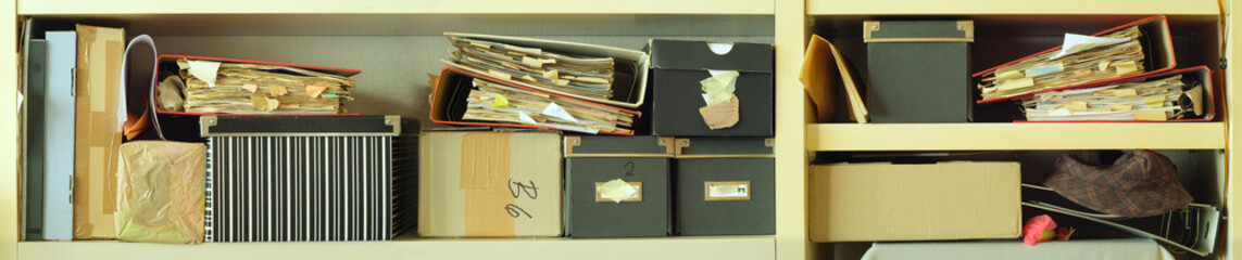 messy file folders and office supplies,red tape, bureaucracy, messy archive, aministration,business...