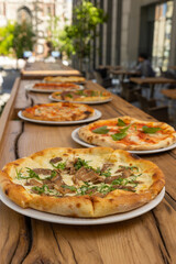 delicious italian pizza on a wooden table
