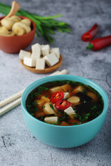 A bowl with miso soup, traditional Japanese dish