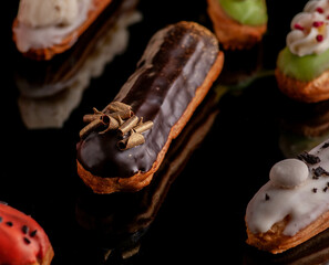 eclairs with different fillings and decorations in different options