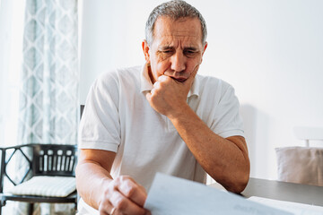 Fototapeta premium Retraining getting an education in middle age, writing an article, checking financial report