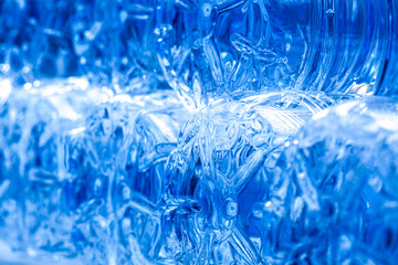 abstract close up pile of plastic water bottles