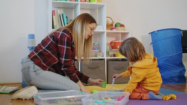 The teacher is a compassionate and patient doctor of education who understands that some kids need extra help to thrive. She visits the child at home to provide private lessons.
