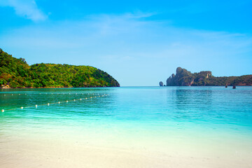 Fototapeta premium Beautiful landscape of the Indian Ocean coast with a sandy beach on the Phi Phi island