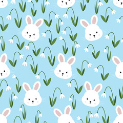 Seamless pattern white bunnies and spring snowdrops