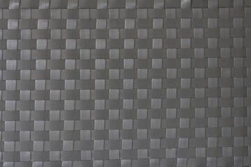 Handmade weave pattern of gray plastic strips texture for mats, baskets or rattan furniture.