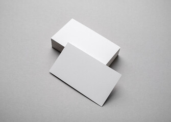 Blank business cards on gray paper background. Template for graphic designers portfolios.