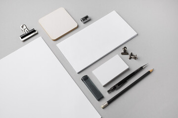 Blank branding stationery set on gray paper background. Responsive design template.