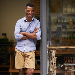 Portrait, coffee shop and black man as small business owner at front door with a smile....