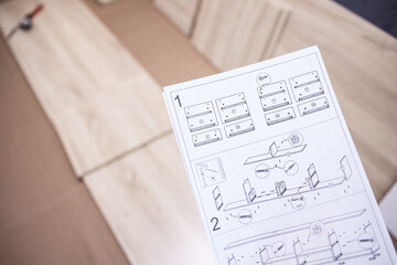 Instructions for assembling the chest of drawers and parts for assembly. Wooden canvas, do it...