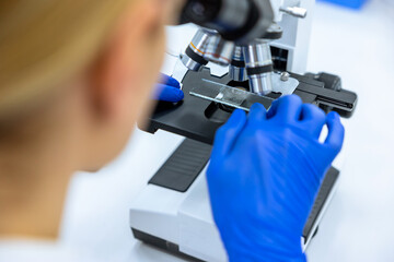 Scientists or researchers perform microscopic endoscopy to examine changes in the chemical reactions