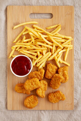 Chicken Nuggets and French Fries with Ketchup Ready to Eat. Flat lay, overhead, from above.