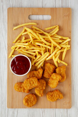 Chicken Nuggets and French Fries with Ketchup Ready to Eat. Flat lay, overhead, from above.