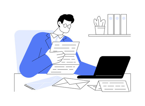 man in blue suit reading papers at desk