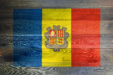 Andorra flag on rustic old wood surface background